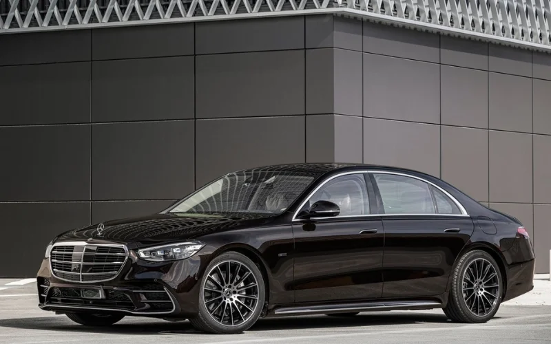 Luxury black sedan chauffeured vehicle